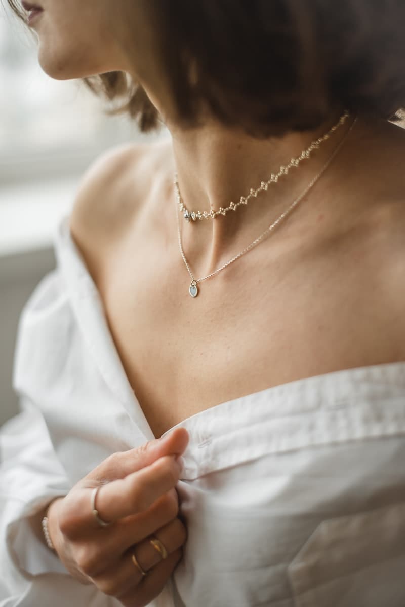 Gold bridal necklace and earring set on display